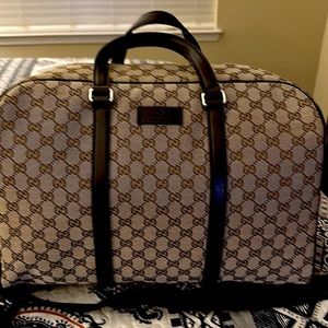 Gucci Large Monogram Boston Duffle Bag Dark Brown this bag is brand new.